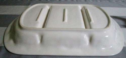 A STUNNING CRISP WHITE SERVING PLATER WITH MARVELOUS RAISED DECORATIVE EDGING