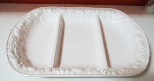 A STUNNING CRISP WHITE SERVING PLATER WITH MARVELOUS RAISED DECORATIVE EDGING