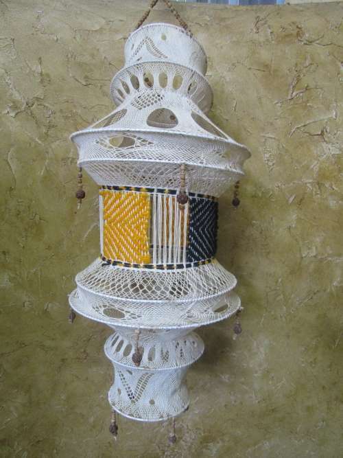 A lovely Vintage macrame plant hanger?