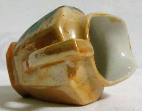 A STUNNING PORCELAIN MILK CREAMER WITH A BEAUTIFUL DUCK DESIGN