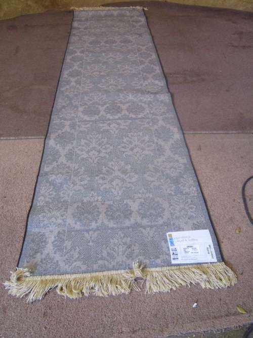 A STUNNING 236CM X 66CM RUNNER CARPET MADE IN BELGIUM