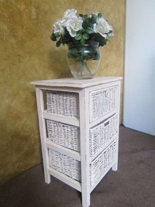 A MARVELOUS PAINTED UNIT WITH THREE WOVEN BASKETS