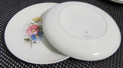 FOUR GORGEOUS PIONEER PORCELAIN SIDE PLATES DECORATED WITH BEAUTIFUL BRIGHT FLOWERS BID PER EACH