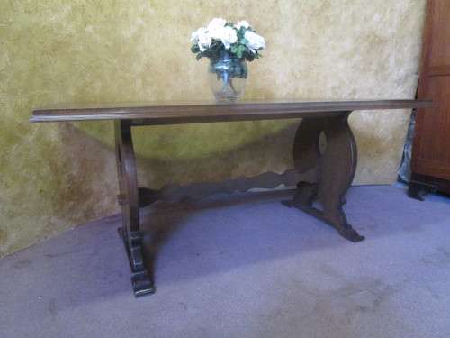 A Fantastic 6 to 8 Seater wooden Table -You can up cycle it by painting it to match your decor.
