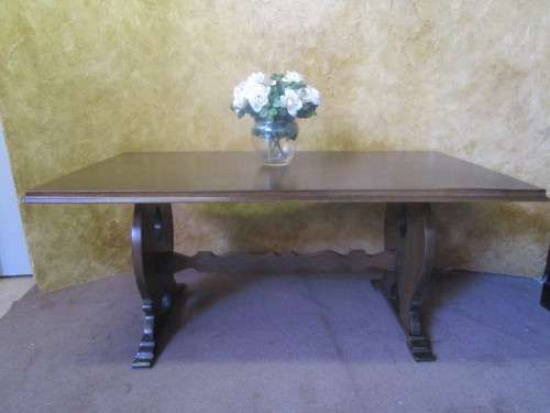 A Fantastic 6 to 8 Seater wooden Table -You can up cycle it by painting it to match your decor.