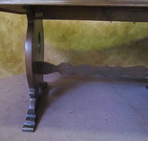 A Fantastic 6 to 8 Seater wooden Table -You can up cycle it by painting it to match your decor.