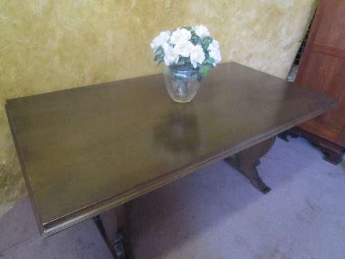 A Fantastic 6 to 8 Seater wooden Table -You can up cycle it by painting it to match your decor.