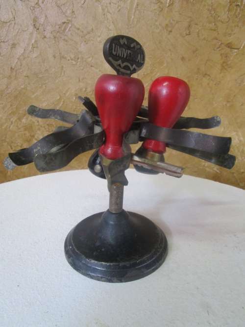 Vintage stamp holder carousel from the 50's The design and details are ornate - stamps included