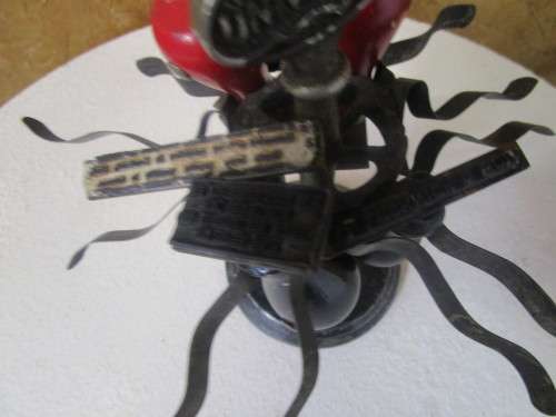 Vintage stamp holder carousel from the 50's The design and details are ornate - stamps included