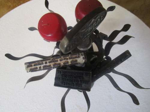 Vintage stamp holder carousel from the 50's The design and details are ornate - stamps included