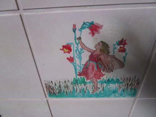 A CUTE PAINTED KIST PERFECT FOR KIDS ROOM TO STORE ALL THE TOYS