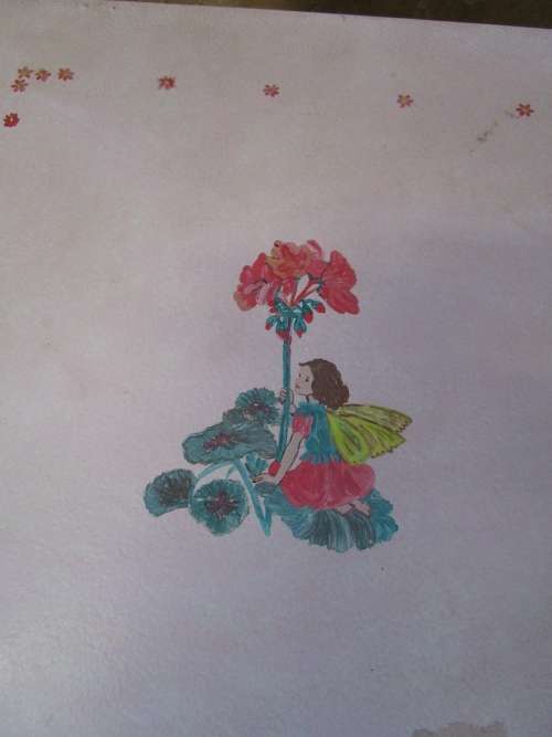 A CUTE PAINTED KIST PERFECT FOR KIDS ROOM TO STORE ALL THE TOYS