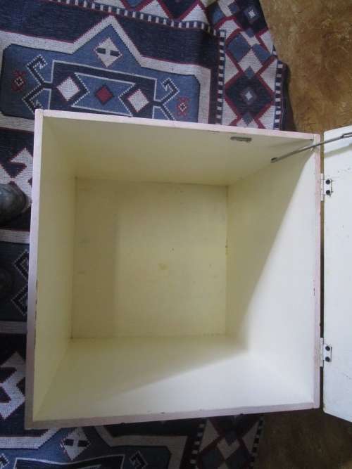 A CUTE PAINTED KIST PERFECT FOR KIDS ROOM TO STORE ALL THE TOYS