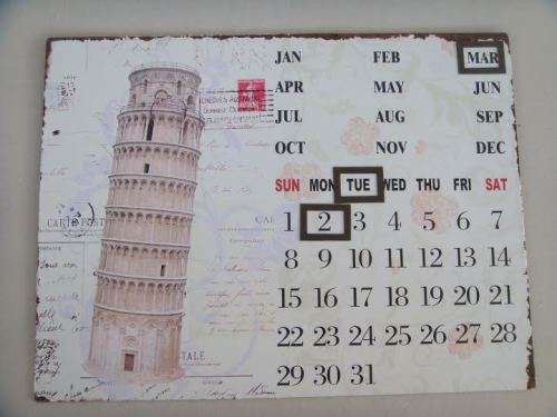 A MARVELOUS VINTAGE LOOKING METAL PALQUE CALENDAR WITH MAGNETS TO MOVE AROUND 40CM X 30CM