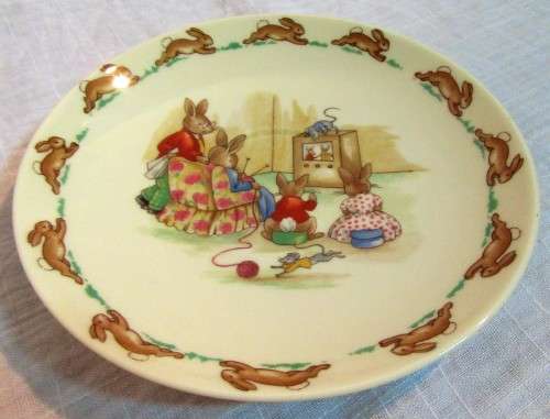 This is a "Bunnykins" child's mug and saucer set by Royal Doulton China. The set is perfect