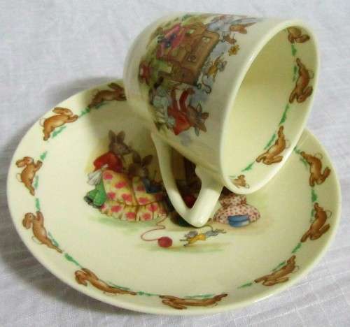 This is a "Bunnykins" child's mug and saucer set by Royal Doulton China. The set is perfect