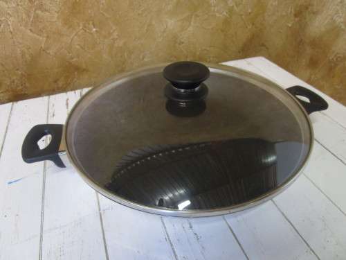 A FANTASTIC COOK TM FRYING PAN WITH A LID WITH TEFLON COATING