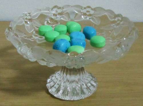AN EXQUISITE PRESSED GLASS BON BON DISH OR SANDWICH PLATTER ON A STAND