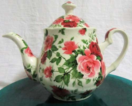 A STUNNING FLORAL VICTORIAN ROSE TEA POT BY WILLIAM JAMES -