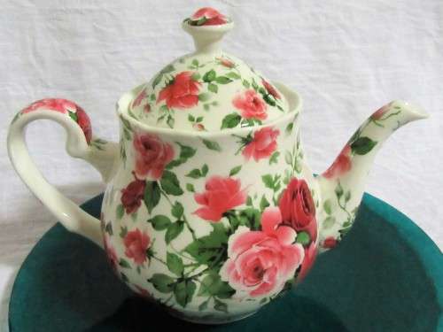 A STUNNING FLORAL VICTORIAN ROSE TEA POT BY WILLIAM JAMES -