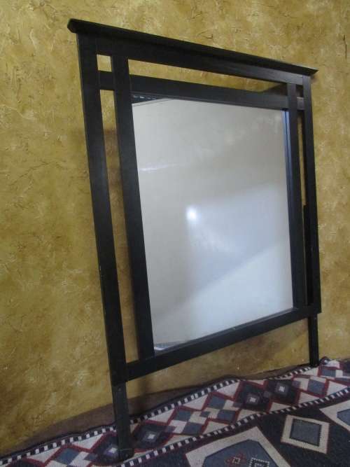 A MARVELOUS VERY LARGE MIRROR - IN A STUNNING DARK FINISHED FRAME