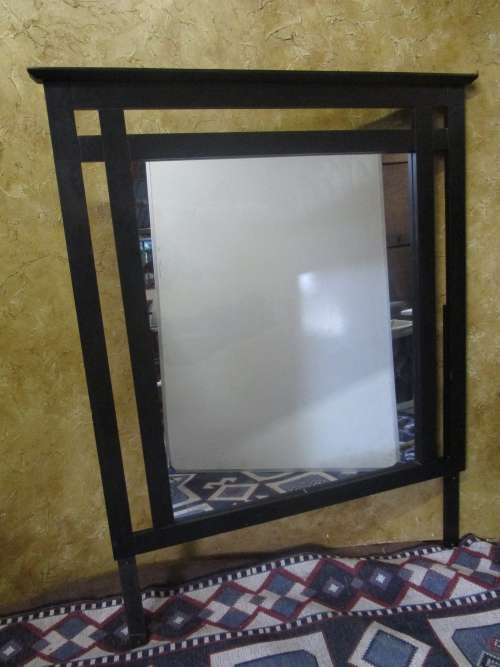 A MARVELOUS VERY LARGE MIRROR - IN A STUNNING DARK FINISHED FRAME