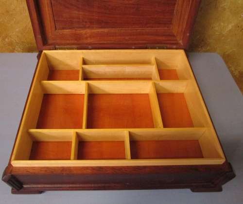 This large wooden box for cigars or jewelry was made by using wood carving techniques