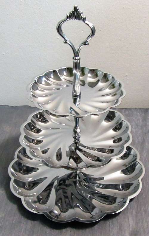 An Exquisite Chrome Plated Three Tiered Dessert/sweats Tray that will be a statement on a Table