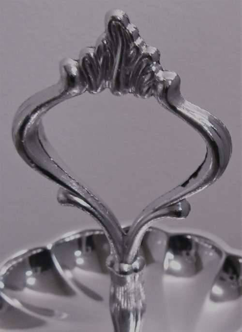 An Exquisite Chrome Plated Three Tiered Dessert/sweats Tray that will be a statement on a Table