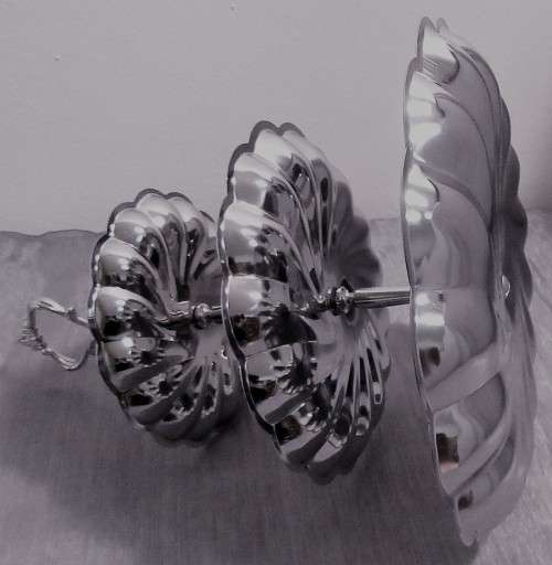 An Exquisite Chrome Plated Three Tiered Dessert/sweats Tray that will be a statement on a Table