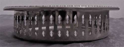 Two Vintage silver plated engraved, galleried champagne or wine bottle coaster