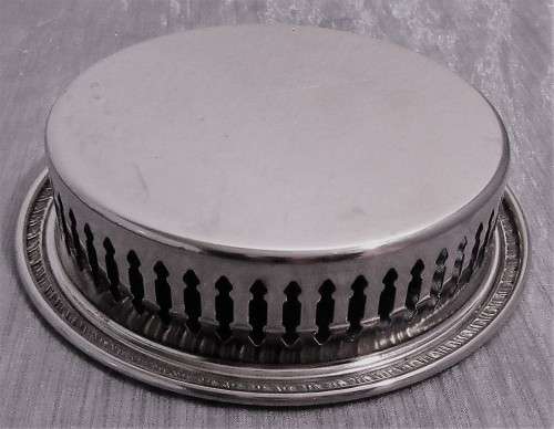 Two Vintage silver plated engraved, galleried champagne or wine bottle coaster