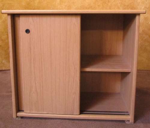 A FANTASTIC FILING CUPBOARD WITH TO SLIDING DOORS PERFECT FOR A HOME OFFICE