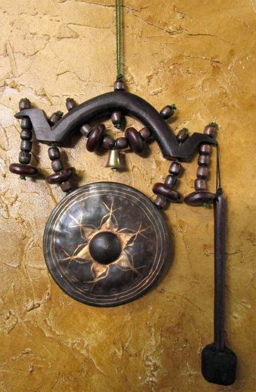 Awesome ornately etched old  gong with burled wood striker-mallet. The gong has loud sound that ling