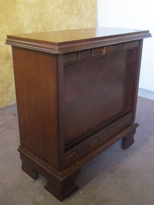 A GORGEOUS VINTAGE TV CABINET CONVERTES INTO A LIQOUR CABINET WITH GLASS SHELFS WITH SLIDING DOOR -