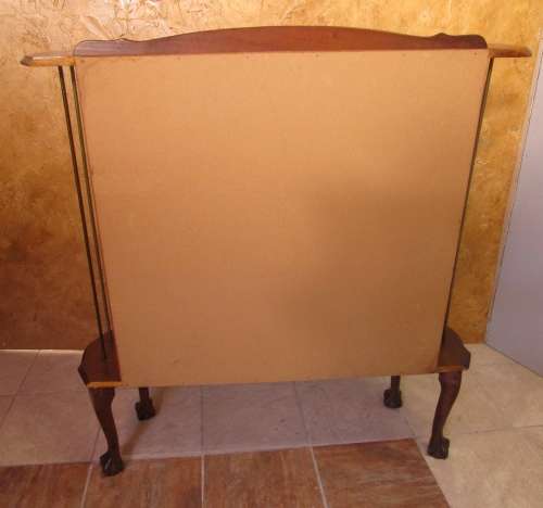 A VERY DIFFERENT IMBUIA BALL & CALW GLASS CABINET WITH A MIRROR AT THE BACK FINISHED OF WITH BRASS