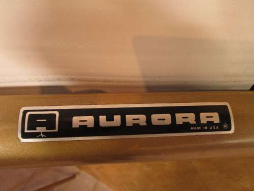 A MARVELOUS VINTAGE PROJECTOR SCREEN IN GOOD CONDITION