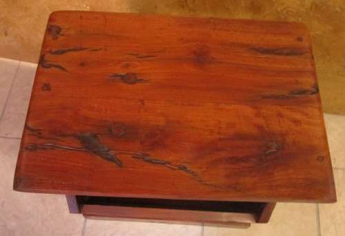 A MARVELOUS SOLID TEAK SIDE TABLE WITH A MAGAZINE RACK