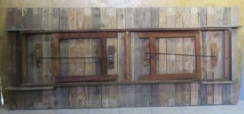 A TRENDY 12 SEATER FOLD UP TABLE WITH A SOLID WOOD FRAME AND SHABBY CHIC TOP