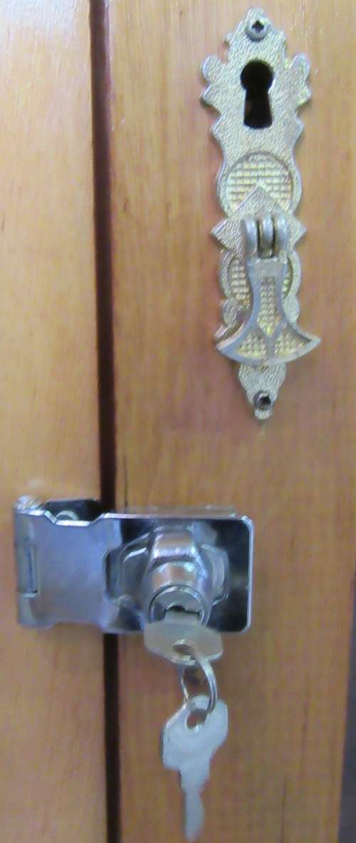 A STUNNING TWO DOOR SHOW/BOOK CASE FROM HEYSTECK RAND FURNITURE FACTORY A PRODUCT OF BOPHUTHATSWANA