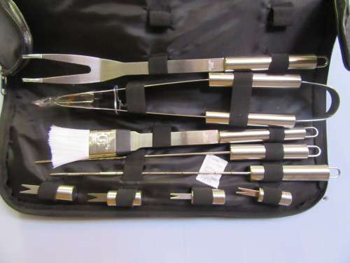 A FABULOUS STAINLESS STEAL BRAAI SET IN A BAG NEVER BEEN USED