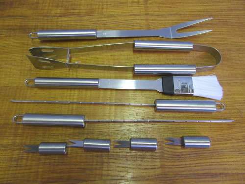 A FABULOUS STAINLESS STEAL BRAAI SET IN A BAG NEVER BEEN USED