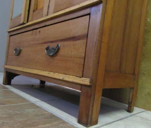 A GORGEOUS 1920'S ARTS AND CRAFTS WARDROBE WITH BEAUTIFUL CARFT DETAIL