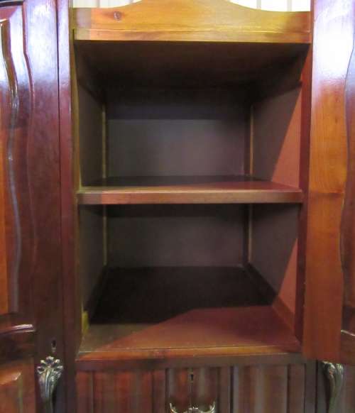 A stunning Three door solid Imbuia wardrobe with solid brass embellishments & ample space