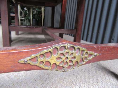 TWO AMAZING TURN OF THE CENTURY SOLID WOOD CARVER CHAIRS WITH BRASS DETAIL