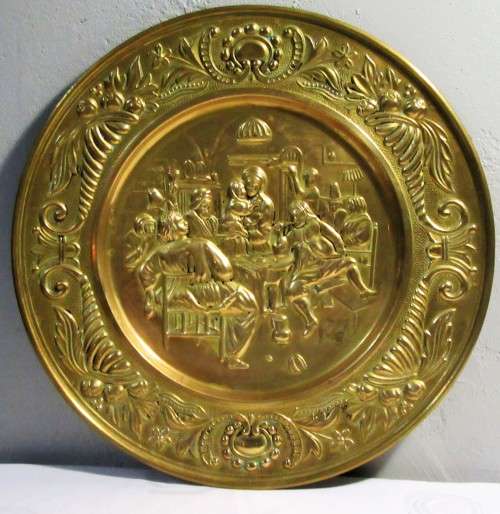 A LOVELY LARGE HAMERD BRASS WALL PLATE