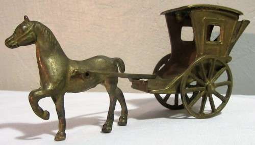A ORNEMENTAL BRASS HORSE & CARRIAGE