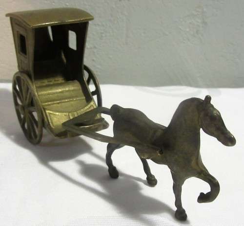 A ORNEMENTAL BRASS HORSE & CARRIAGE