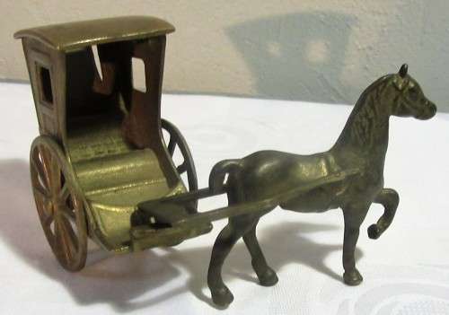 A ORNEMENTAL BRASS HORSE & CARRIAGE