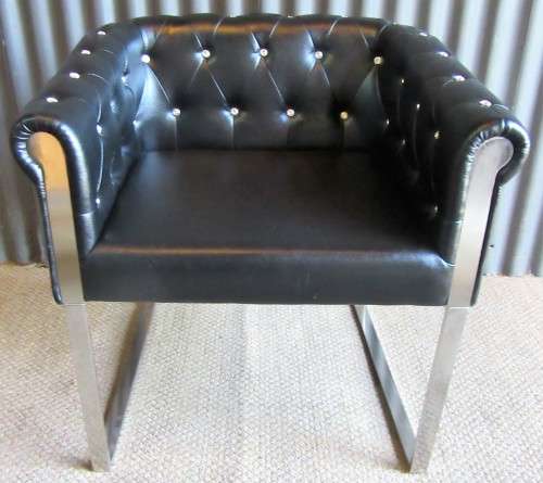 A ELGANT & STYLISH BAKOS BROTHERS STAINLESS STEEL AND FOW LEATHER OCASIONAL CHAIR